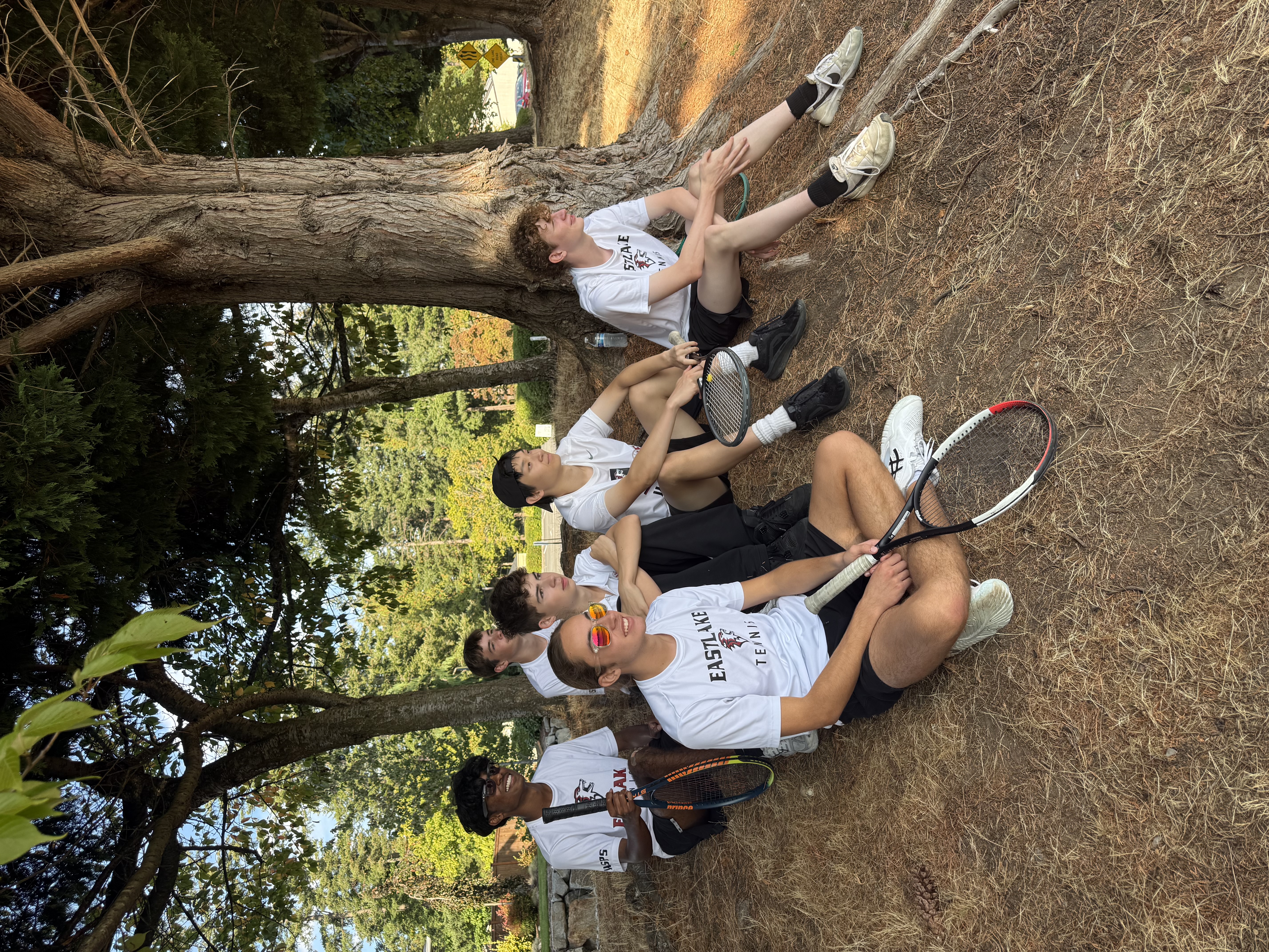 Eastlake Boys Tennis players gathering outdoors before a match